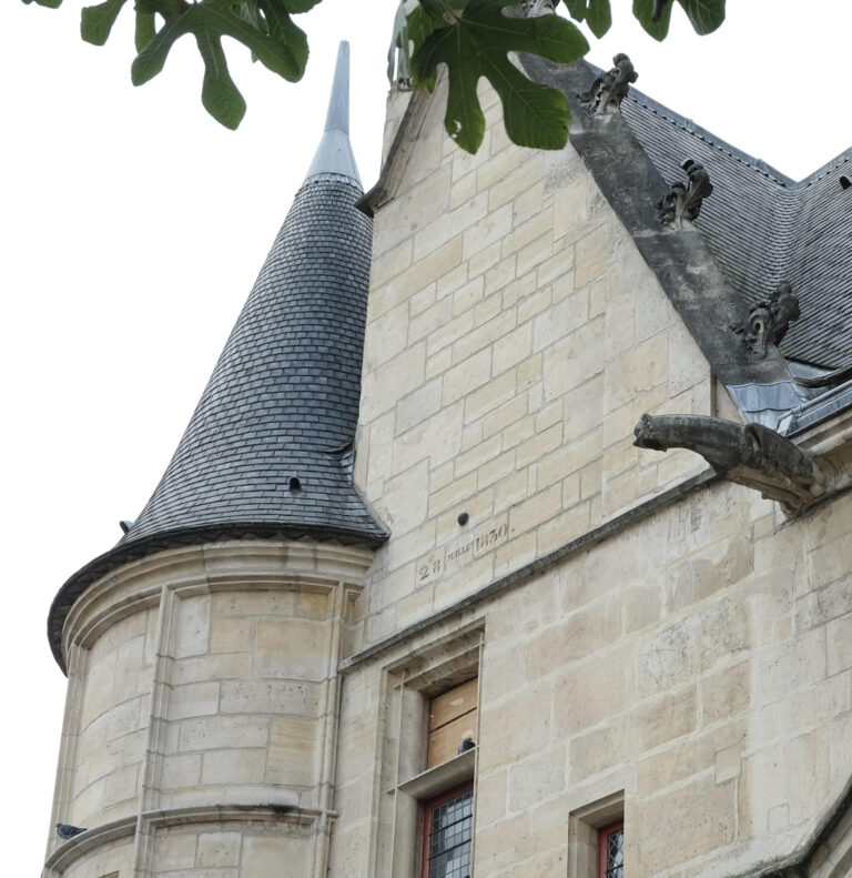 A cannonball lodged into the wall at the Hotel de Sens in paris